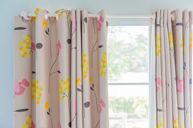 Open curtains How to Keep Your Home Safe During Long Vacations