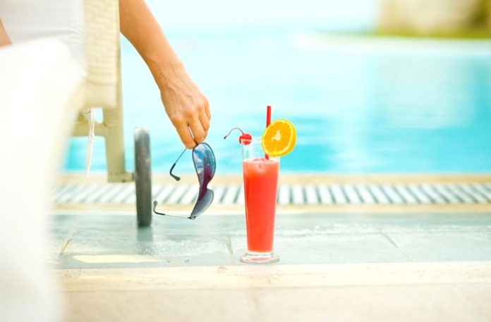 Relaxing by Swimming Pool 11 Must-haves for Ultimate Staycation