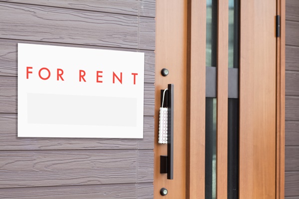 Rental Real Estate Sign in Front of house